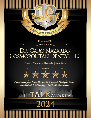 The image displays an award certificate with text and symbols. It features a black background with gold accents, including a crest at the top left corner. At the center of the certificate is a large number '10' in bold gold font. Below this number, there's a name 'Dr. Garo Nazarian Cosmetic Dental L.L.C.' followed by an address and contact information. The certificate mentions 'Award for Excellence in Patient Satisfaction' and includes a logo for 'The Talk Awards 2021.' There are five stars at the bottom right corner of the certificate, and below them is a tagline that reads, 'Voted for excellence in patient satisfaction by The Talk Awards 2021.' The overall style of the image suggests it's an official recognition or award.