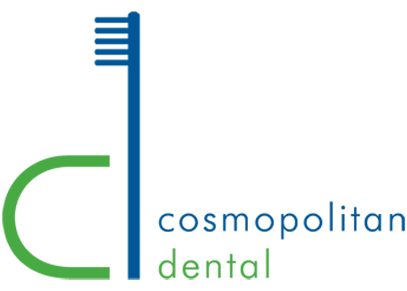 The image features a logo with a stylized toothbrush on the left side, connected by a curved line to the letters  CD  in bold blue font, followed by the word  COSMOPOLITAN  in uppercase letters beneath it. To the right of  CD,  there is a graphic element resembling a brushstroke or paint splatter in green and white colors. The background is plain and does not provide additional context about the nature of the business or service represented by the logo.