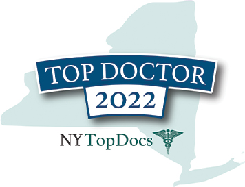 The image features a logo with the text  TOP DOCTOR 2021  prominently displayed above an illustration of the state of New York, indicating a connection to New York for a top doctor accolade in the year 2021.