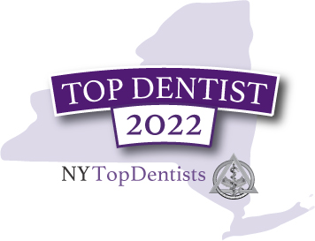 The image features a logo with text that reads  TOP DENTIST 2021  prominently displayed above the word  NYTOPDENTISTS.  Below this, there s an emblem of a stylized maple leaf, and beneath that is the year  2021.  The overall design suggests it is related to dental care or recognition in New York for the year 2021.