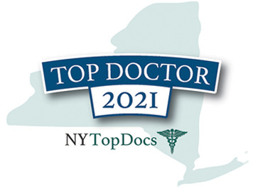 The image features a logo with text elements, predominantly displaying the words  TOP DOCTOR 2021  along with an emblem resembling a shield with a map of New York State at its center and a banner beneath it indicating  NYTOPDOCS.  The design is professional and suggests recognition or accreditation within the medical field for the year 2021.